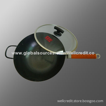 Carbon steel wok with wooden handle